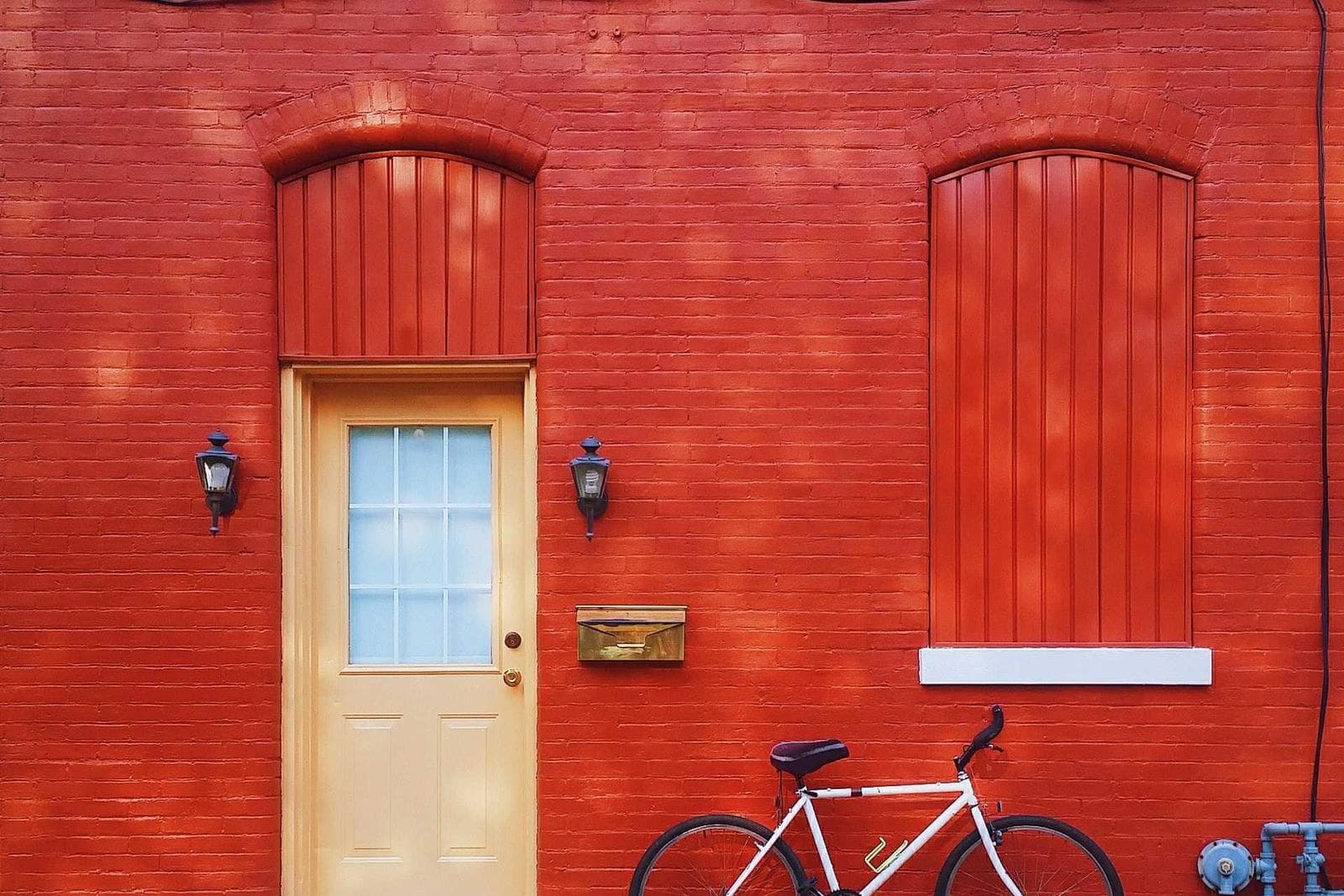 Exterior view from the south garden showing cantilevered upper volume